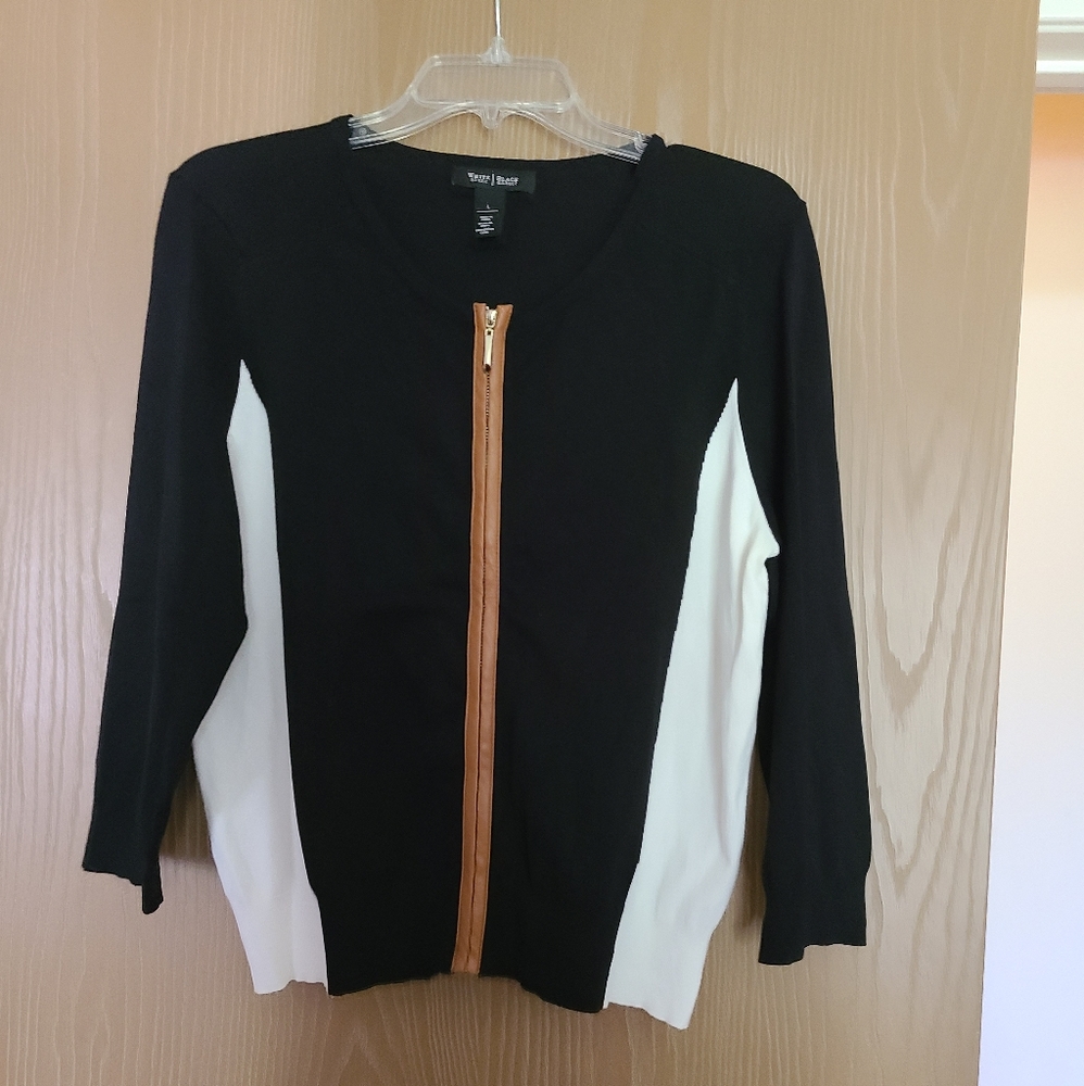Black and cream sweater